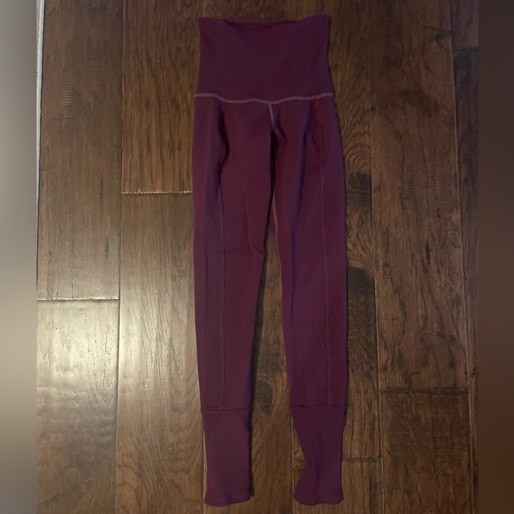 Karma yoga pants / leggings. Color: plum / maroon. Size small or xs